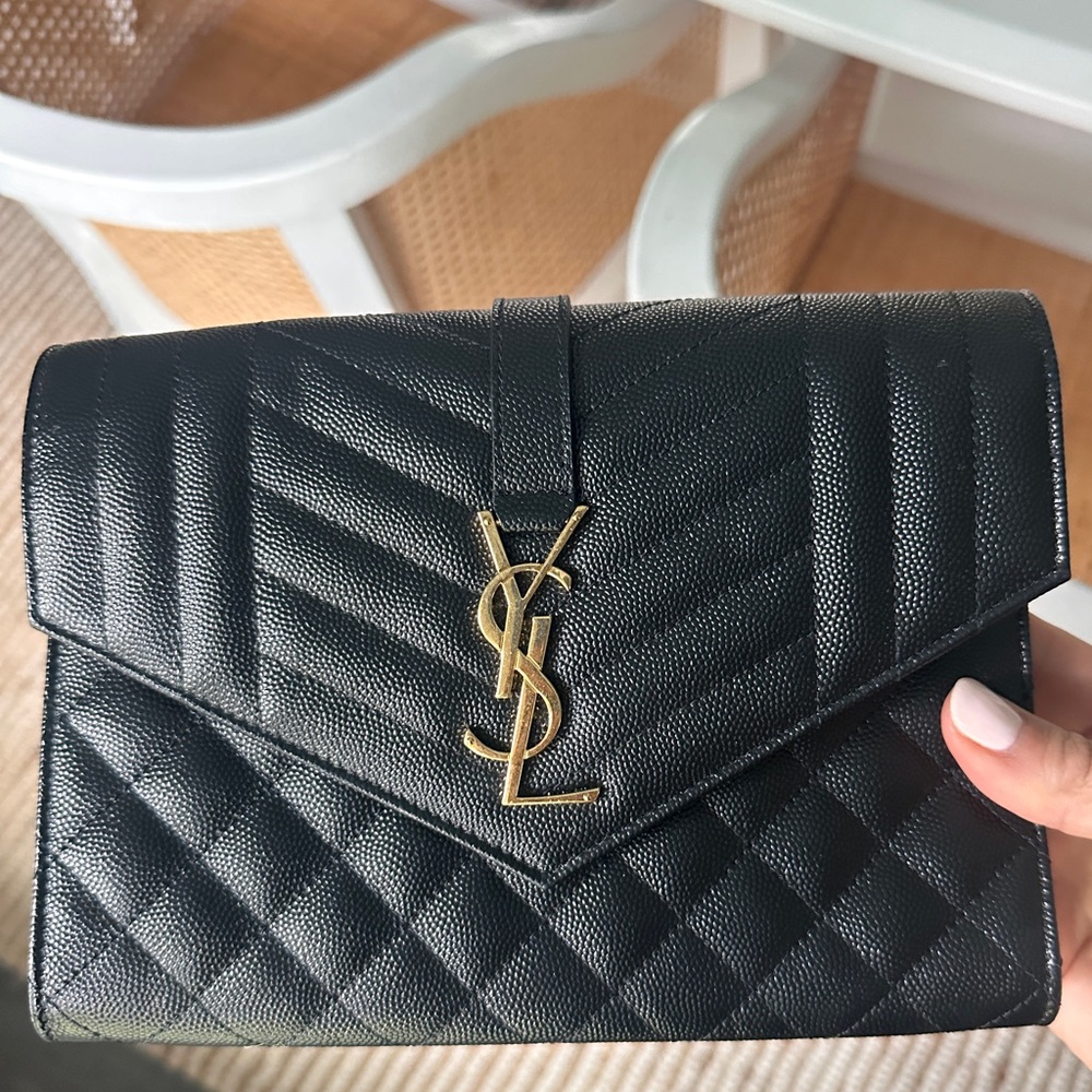 Envelope flap YSL clutch in grained leather